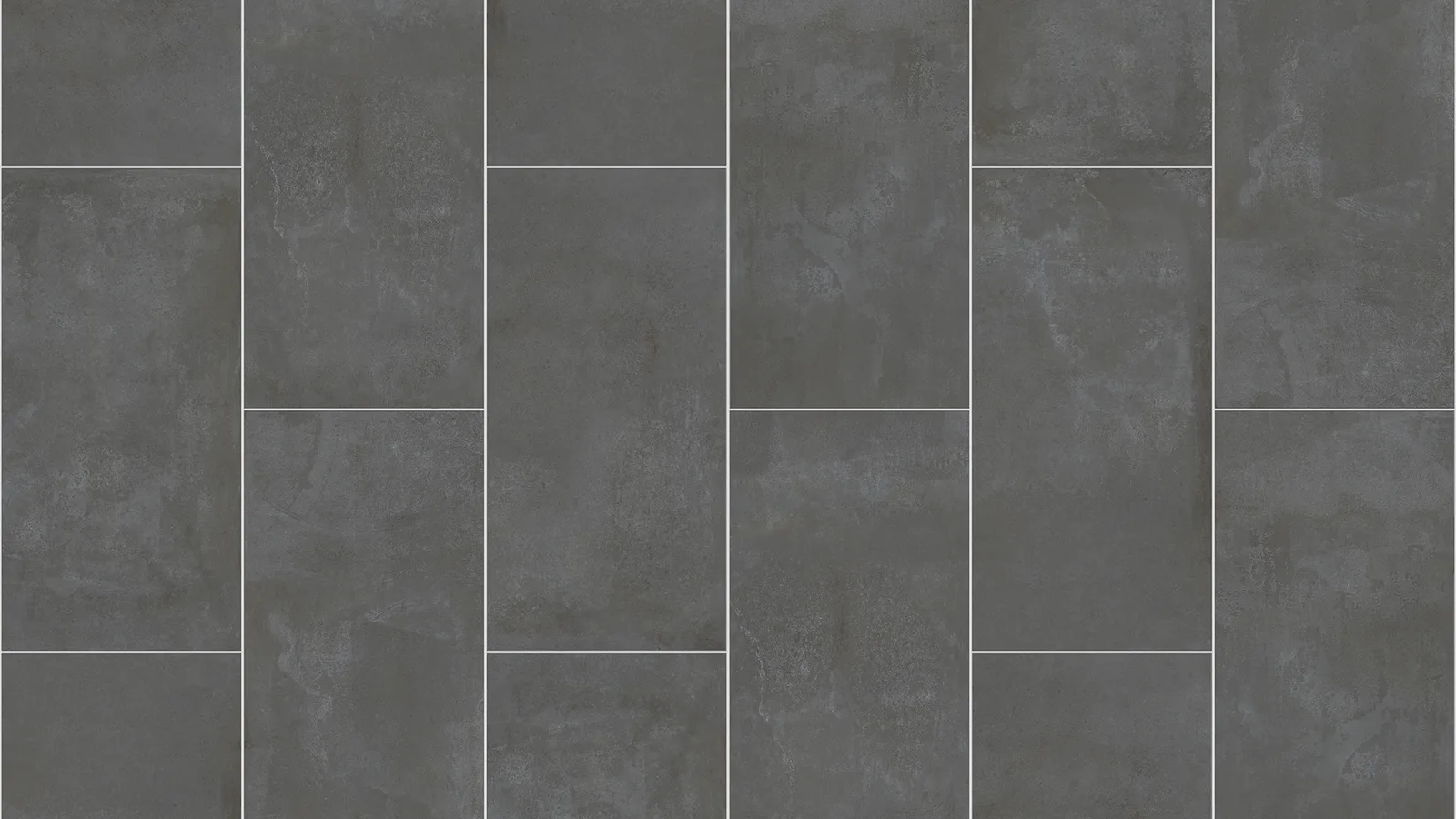 Close view of grey floor tiles and the grout lines between them
