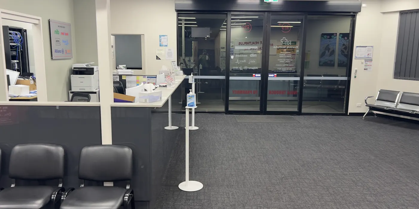 The reception counter and entry doors, carpet cleaned right up to the glass.