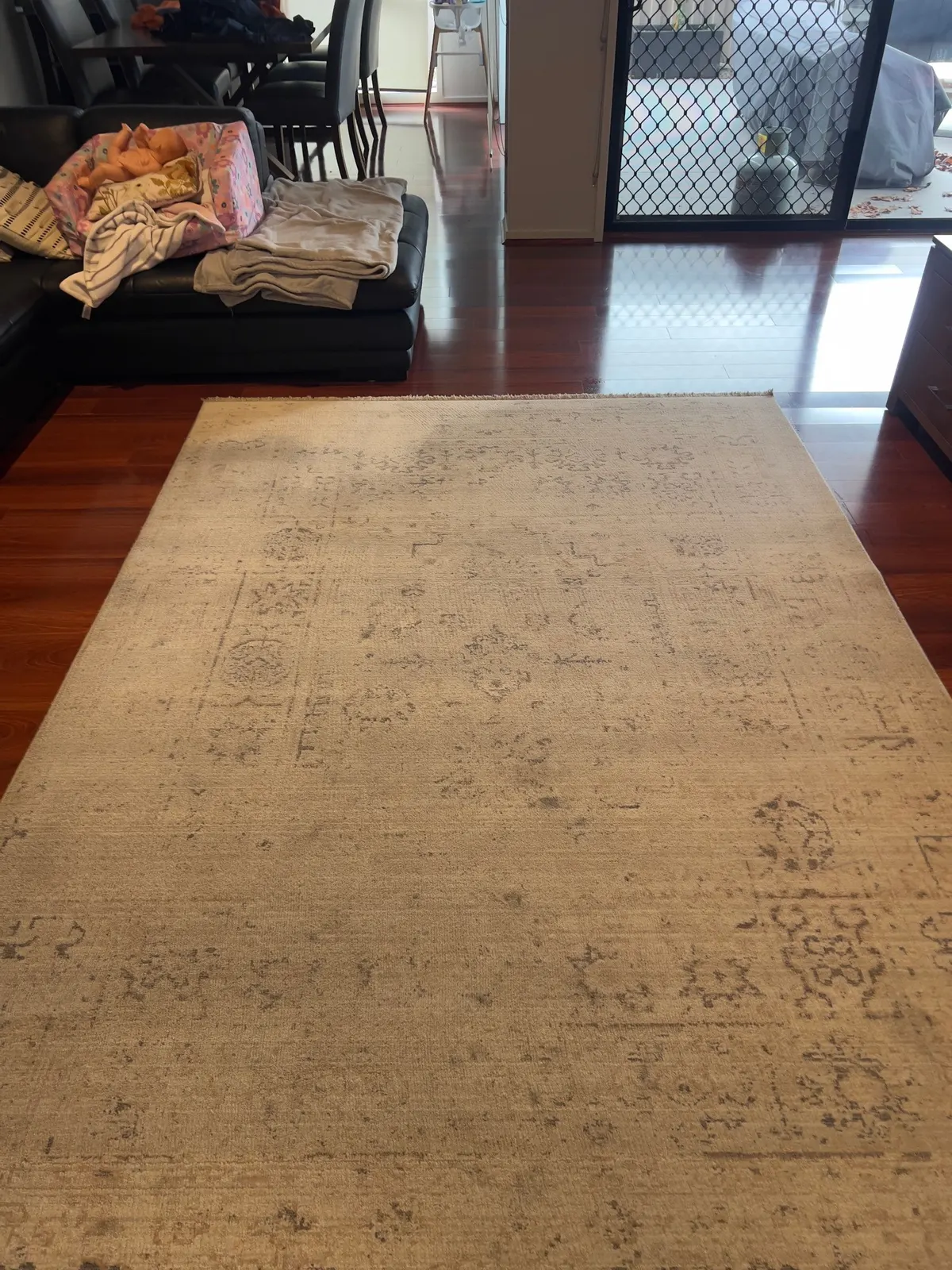 Large patterned lounge rug after cleaning on a Point Cook job, back in the living room