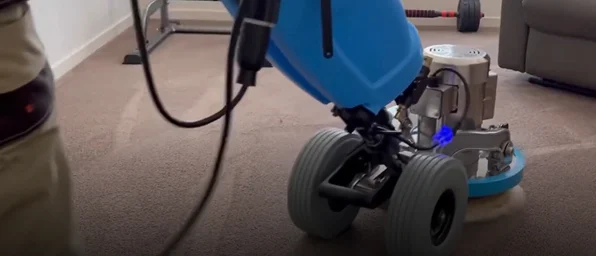 Wool carpet being cleaned with controlled moisture in a Melbourne west home