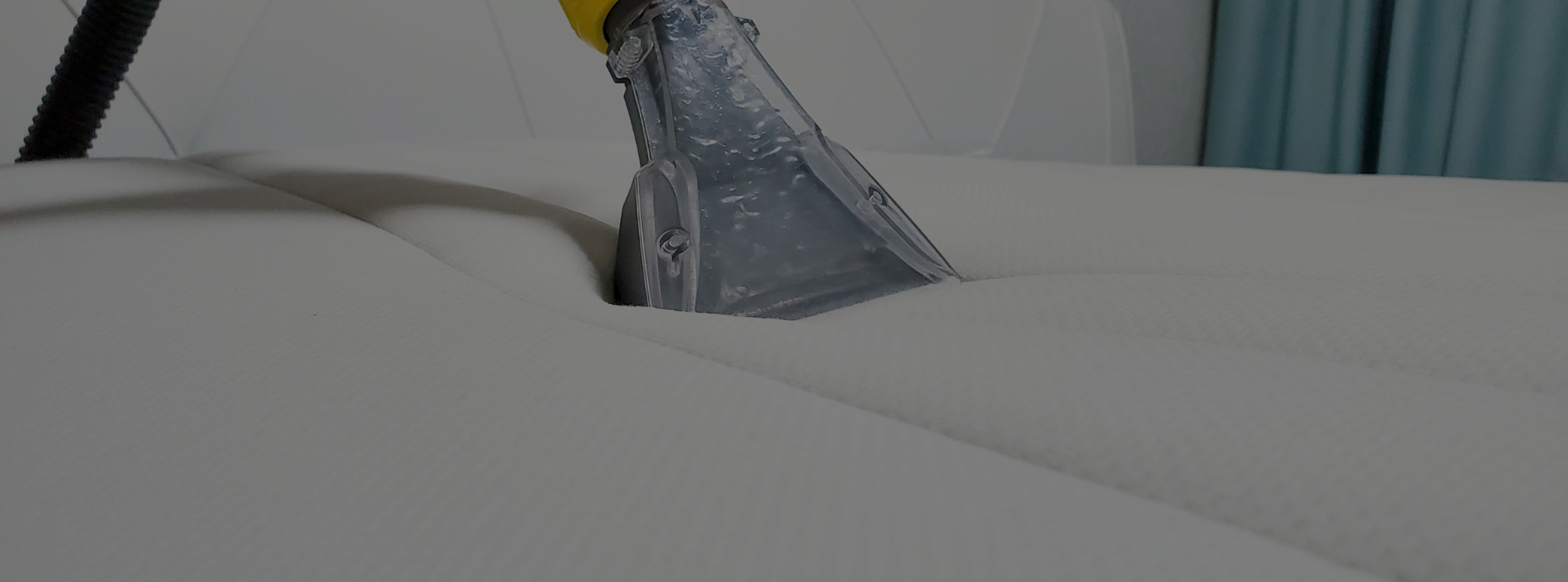 A mattress being cleaned